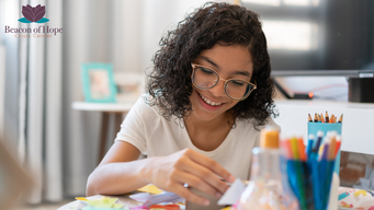 young girl drawing